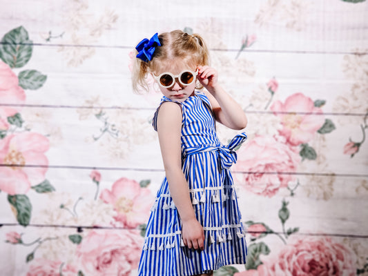 Little Girl Blue and White stripe tassel dress with tie.